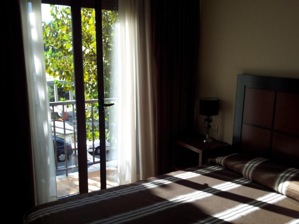 Hotel Av Apartamentos Ловьос Номер фото